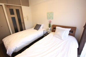 Twin Room (Sofa bed and Single bed) | Desk, laptop workspace, free WiFi, bed sheets - Forest Inn Fukuoka (Fukuoka)