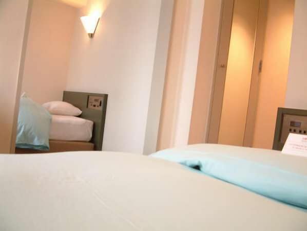 Down duvets, free WiFi - Olympic Inn Azabu (Tokyo)