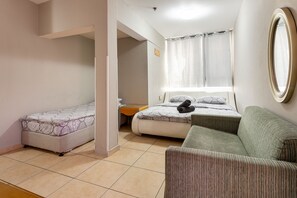 Chambre Triple | Minibar, Wi-Fi gratuit, draps fournis