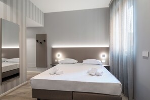 Chambre double ou avec lits jumeaux | Minibar, coffre-fort, bureau, accès au Wi-Fi (inclus)