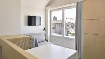 Apartment, 1 Bedroom (José Pedro Croft) | Living area | Flat-screen TV