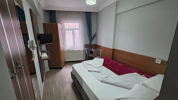 Desk, free WiFi, bed sheets