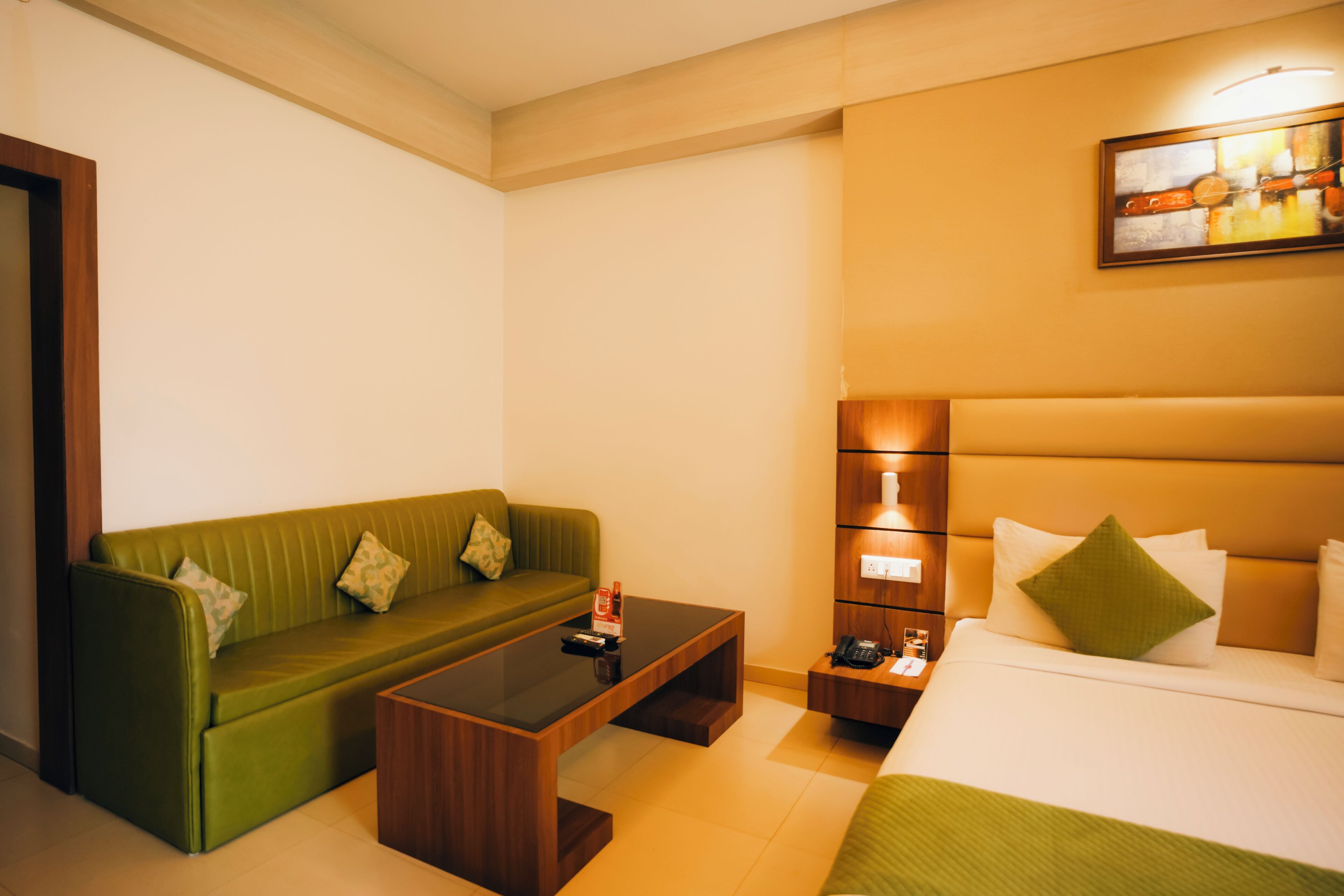 premium room | living area | flat-screen tv