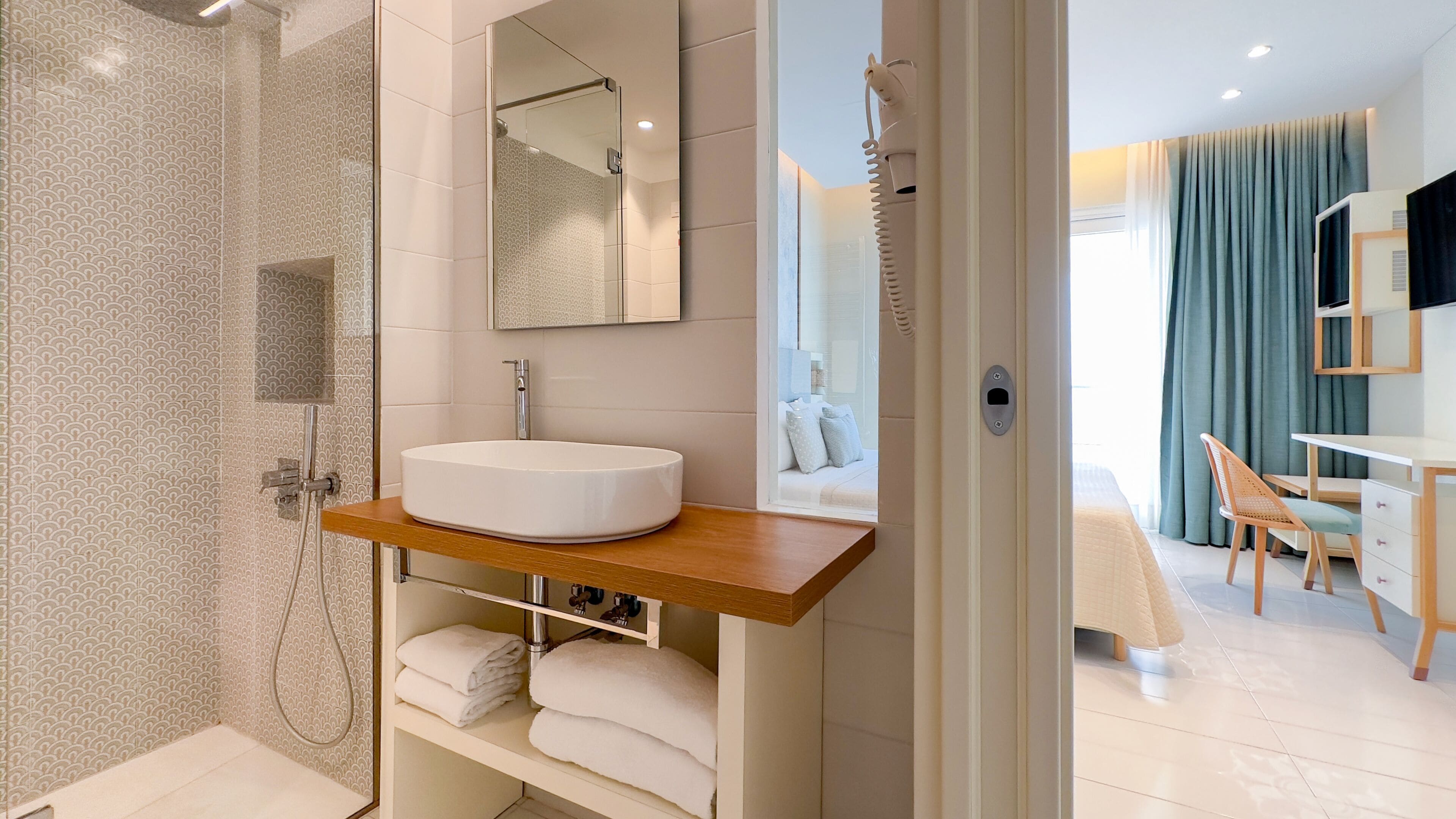 shower, free toiletries, hair dryer, slippers