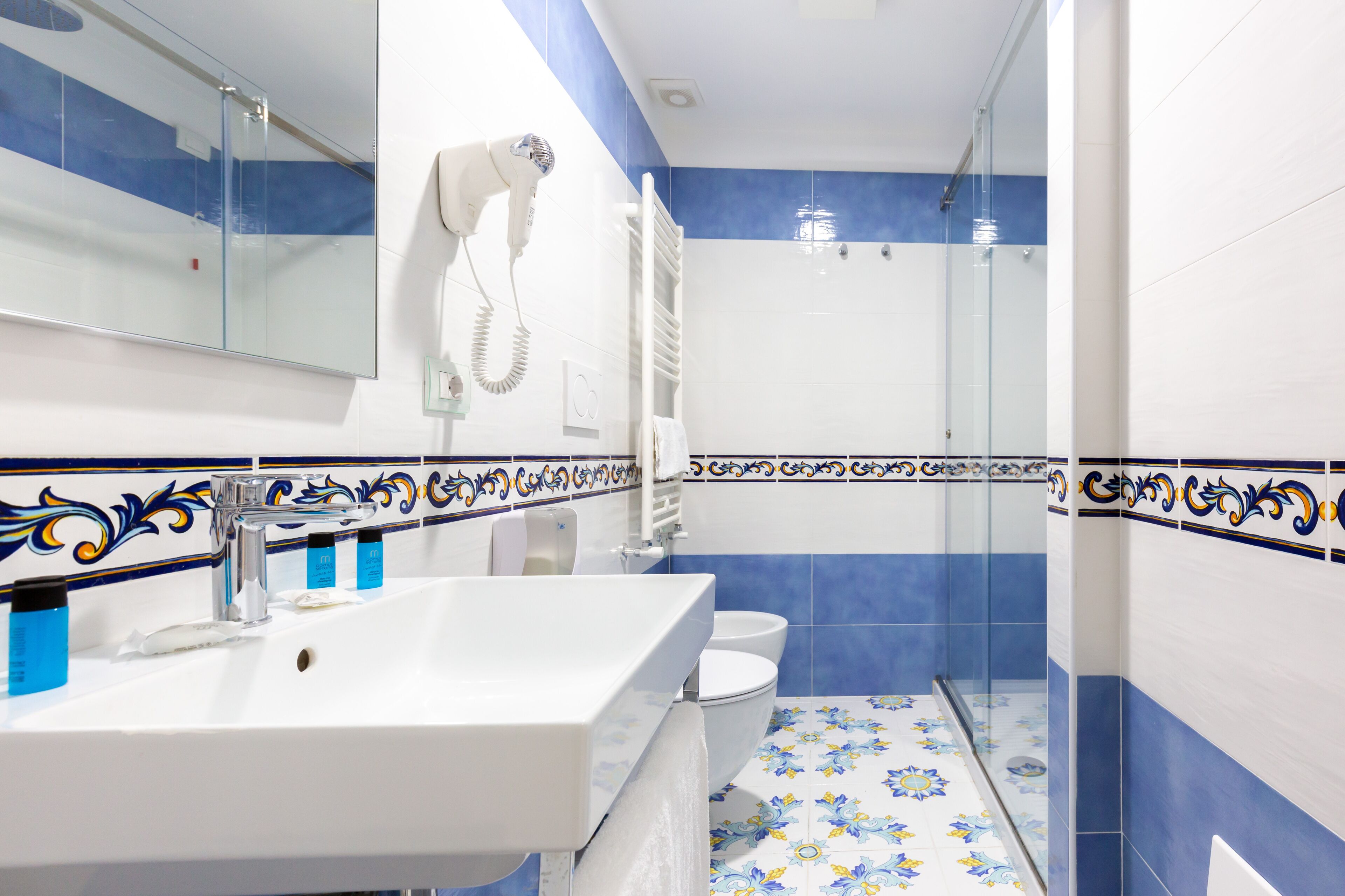 comfort room | bathroom | shower, free toiletries, hair dryer, slippers