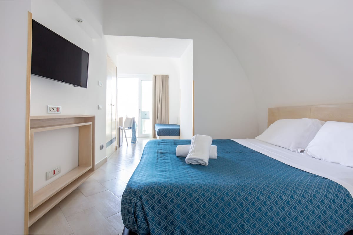 Superior Triple Room, Sea View | 1 bedroom, minibar, desk, free WiFi