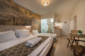Double Room, Garden Area | Minibar, in-room safe, desk, blackout drapes
