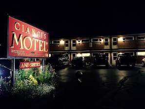 A motel with a large sign advertising 'CIANCIS MOTEL' and 'AND SUITES'. - Cianci's Motel and Suites (Greenville)