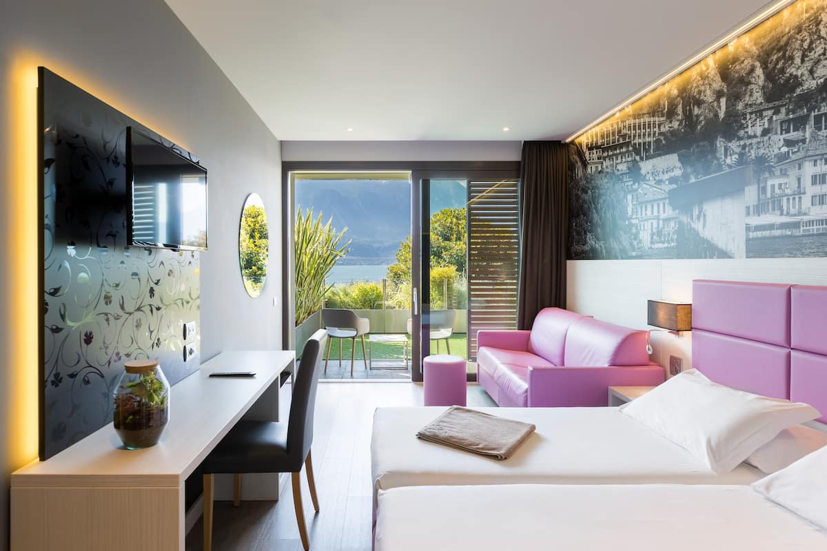 studio suite, hot tub, lake view (xl terrace) | in-room safe, desk, laptop workspace, soundproofing