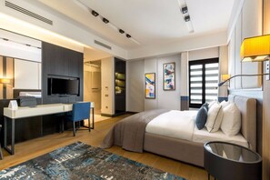 A modern hotel room with a bed, desk, and TV. - The Fortyfive Business Hotel & Spa (Manisa)