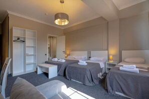 Quadruple Room with City View | 1 bedroom, in-room safe, desk, soundproofing