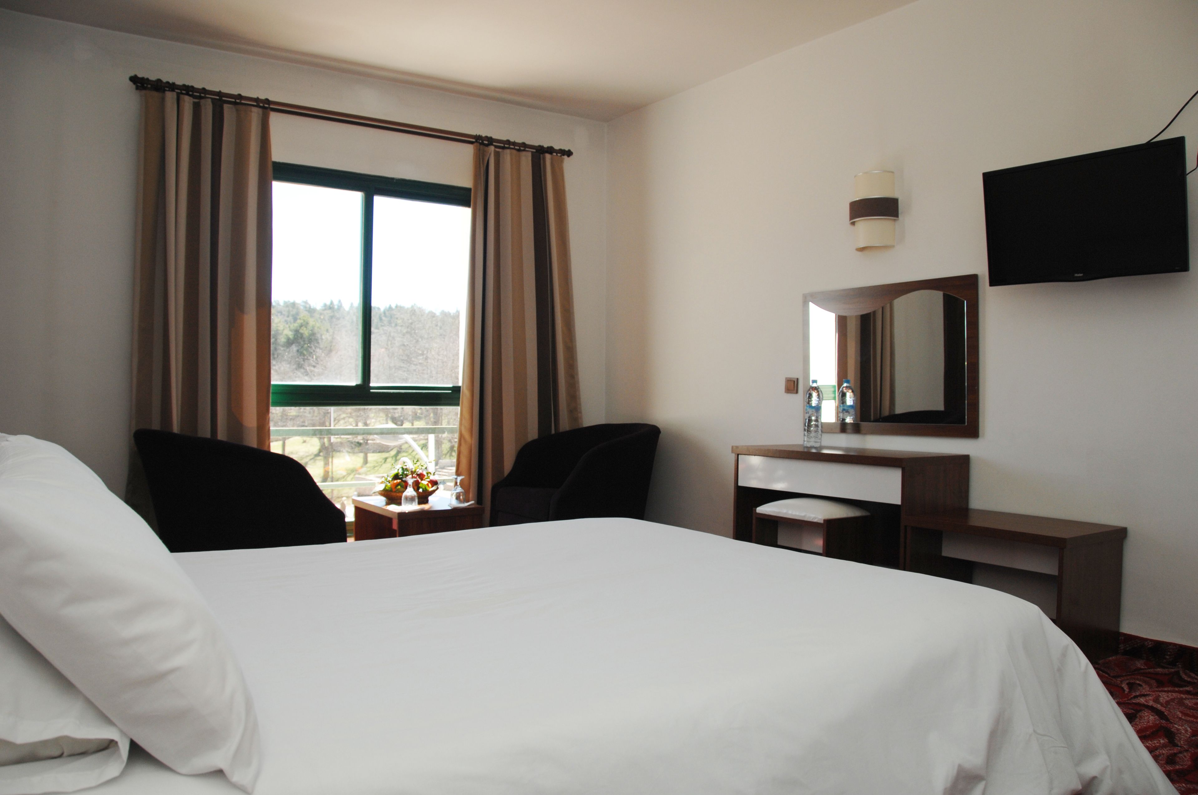 Double or Twin Room | Blackout drapes, iron/ironing board, bed sheets