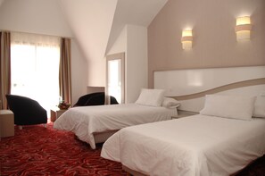 Triple Room | Blackout curtains, iron/ironing board, bed sheets