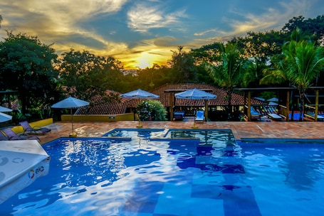 Indoor pool, outdoor pool, open 9:00 AM to 8:00 PM, pool umbrellas
