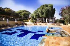 Indoor pool, outdoor pool, open 9:00 AM to 8:00 PM, pool umbrellas