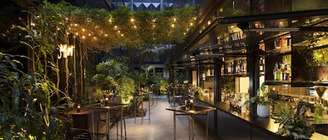 Garden views, serves lunch, dinner, and happy hour