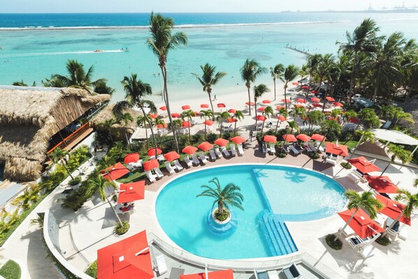 Outdoor pool, open 9:00 AM to 7:00 PM, pool umbrellas, pool loungers