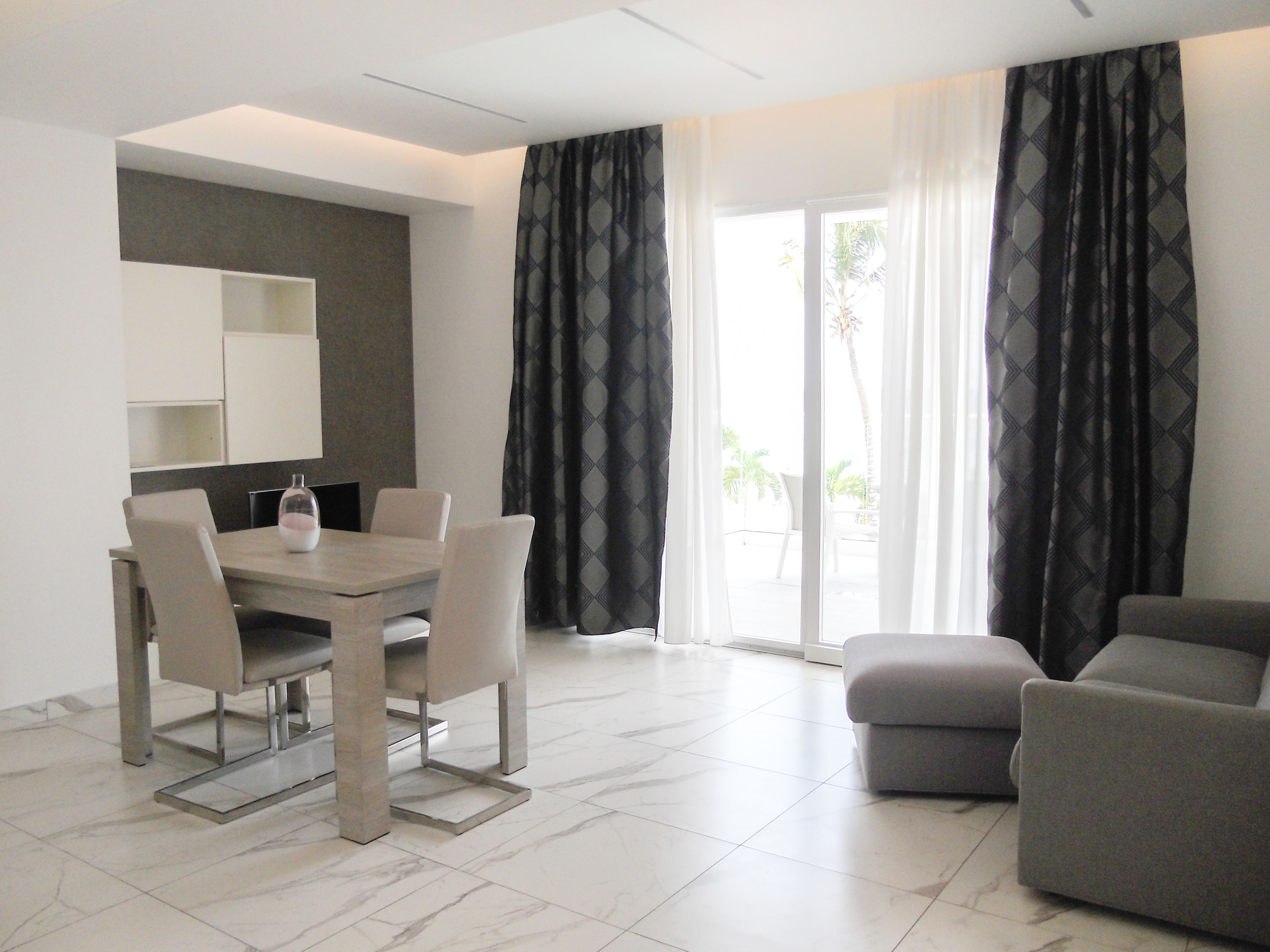 Junior Suite, Sea View | Living room | 32-inch TV with cable channels