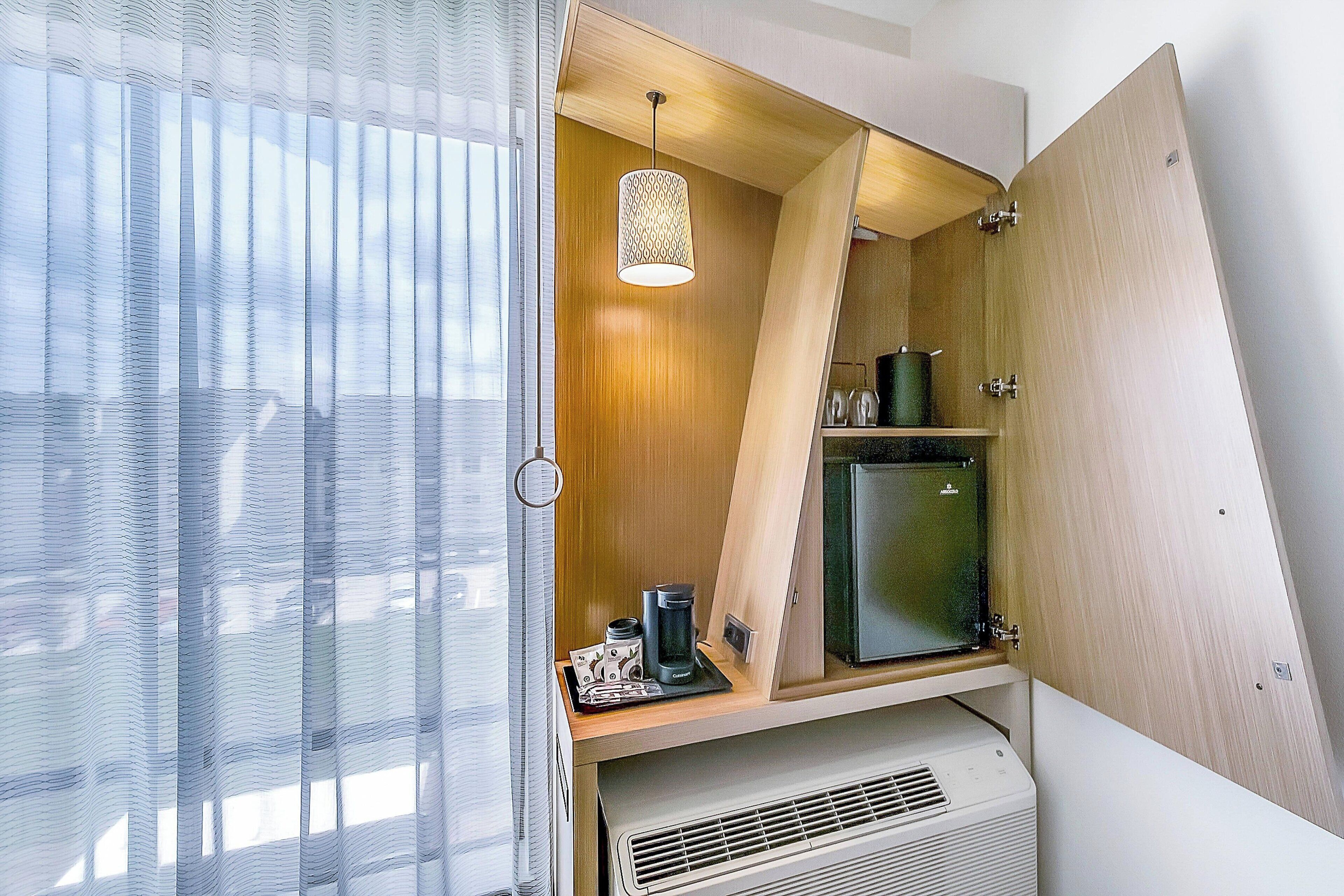 hypo-allergenic bedding, desk, blackout curtains, iron/ironing board