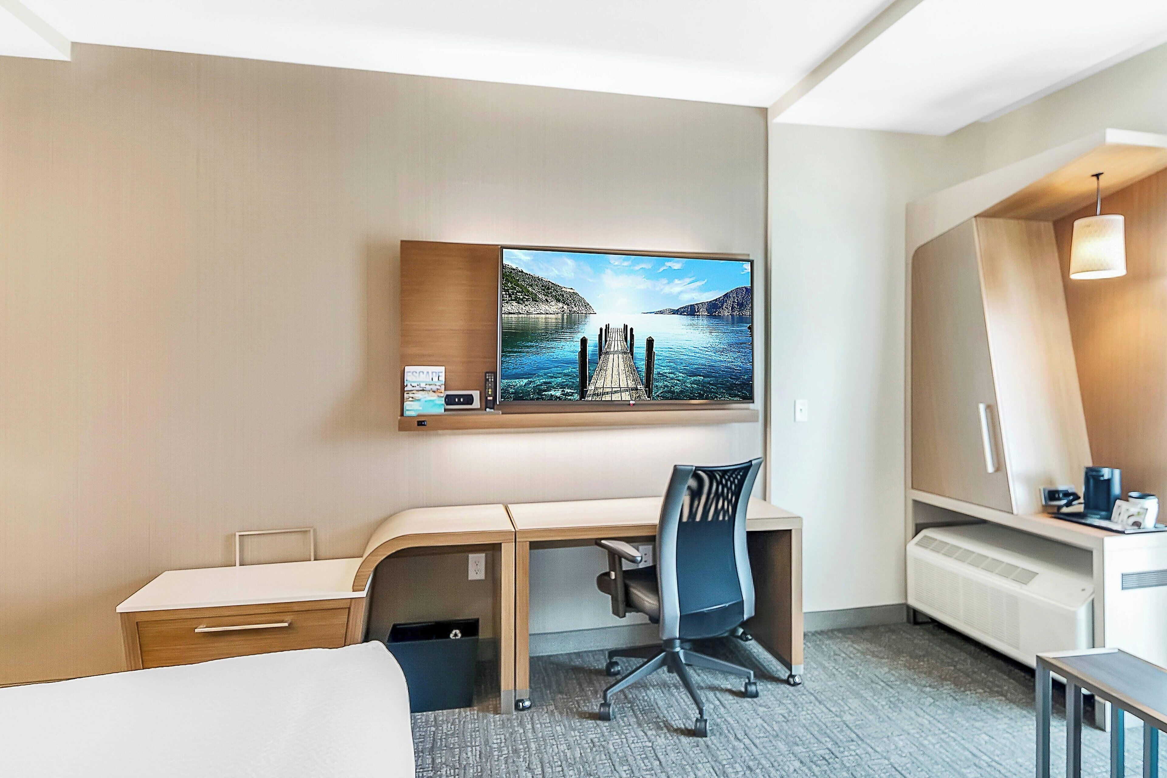 hypo-allergenic bedding, desk, blackout curtains, iron/ironing board