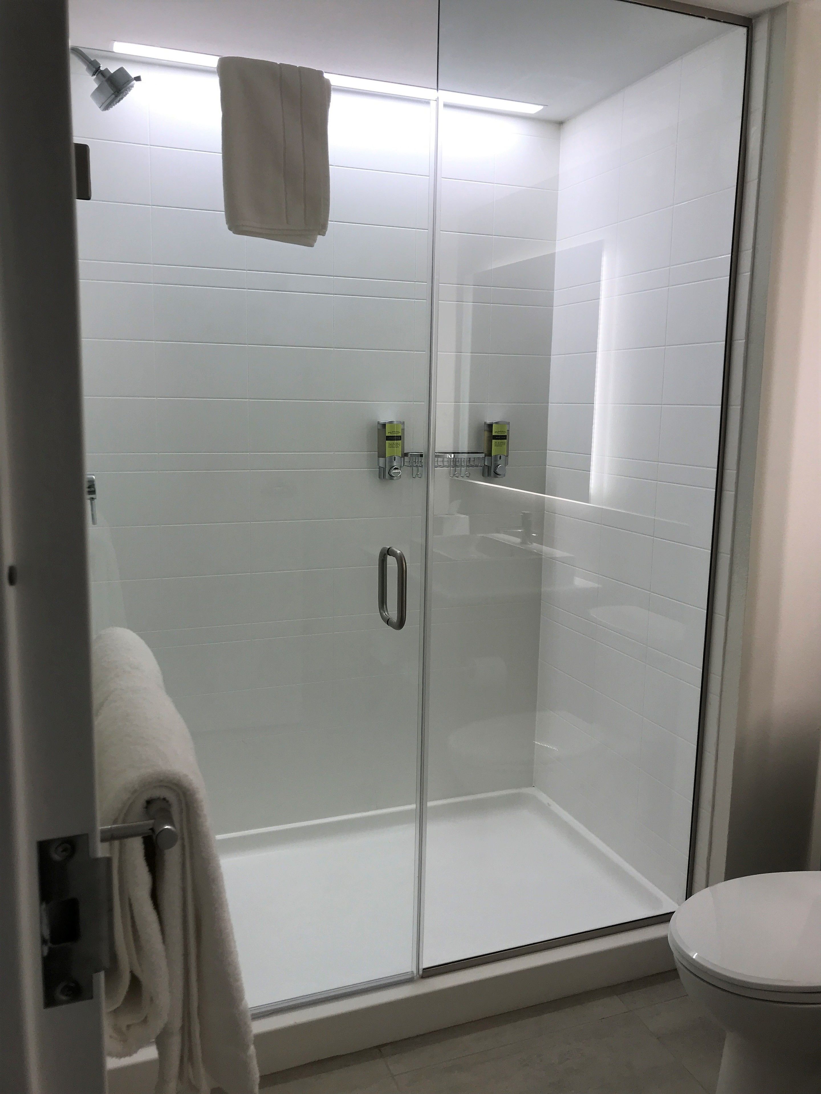 rainfall showerhead, free toiletries, hair dryer, towels