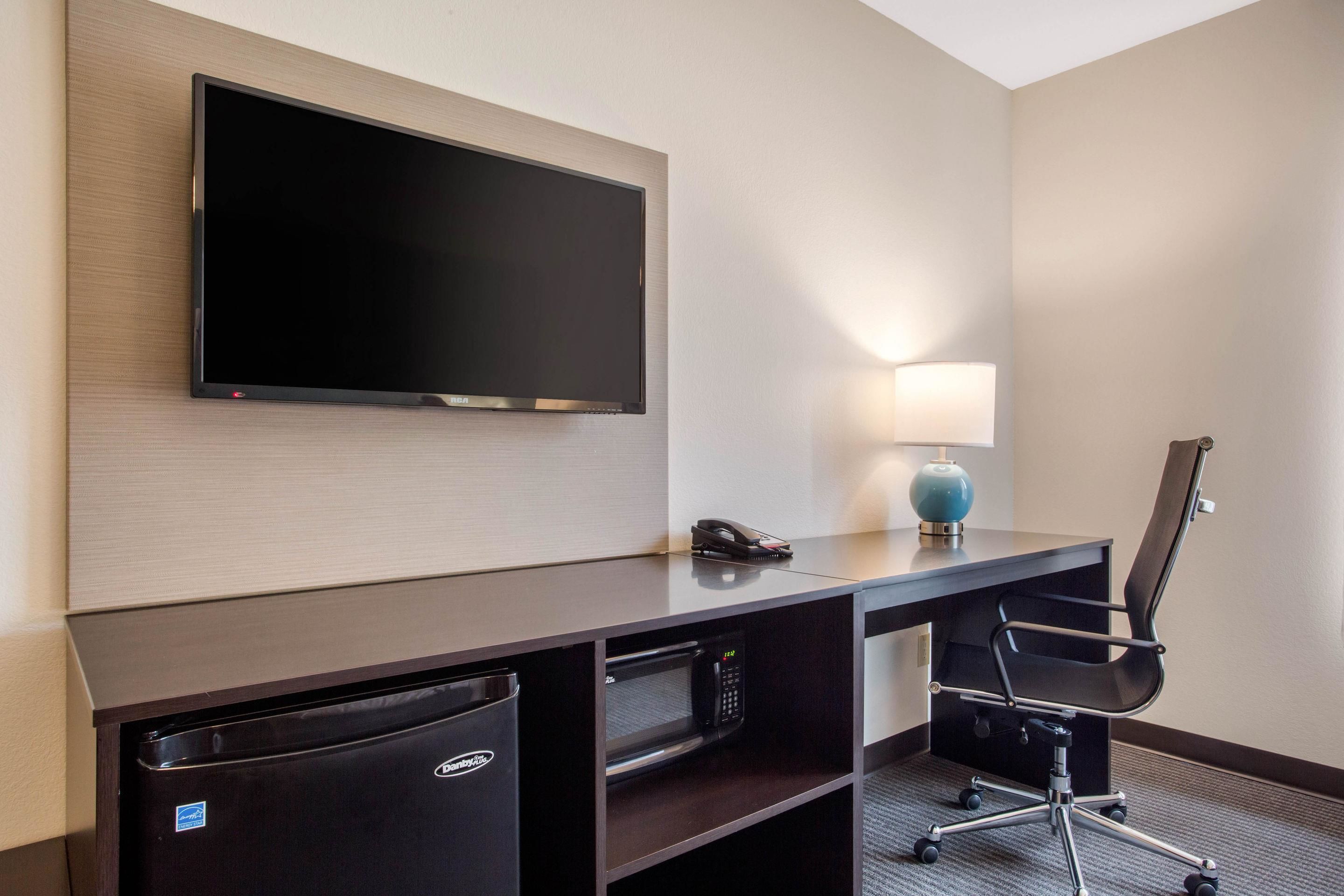 suite, 1 king bed, non smoking | desk, laptop workspace, blackout curtains, iron/ironing board