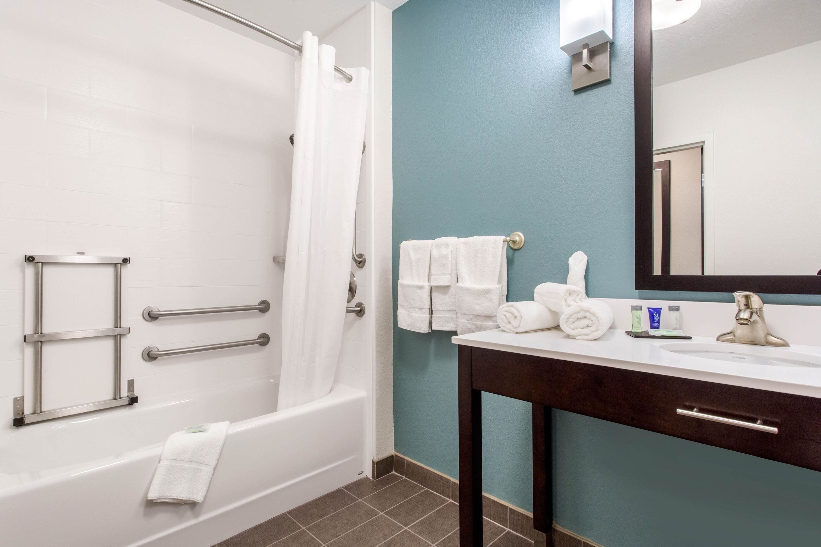 desk, laptop workspace, blackout curtains, iron/ironing board