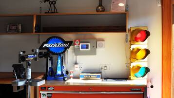 A workshop with a red workbench, tools, and a sign that reads "Parktool."
