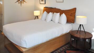 Astro Queen | Premium bedding, down comforters, memory foam beds, minibar