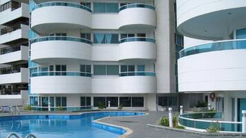 Outdoor pool, pool umbrellas, pool loungers