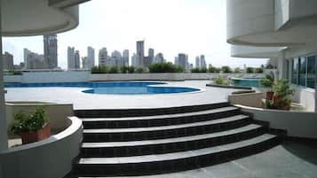 Outdoor pool, pool umbrellas, pool loungers