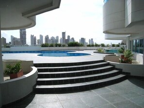 Outdoor pool, pool umbrellas, pool loungers