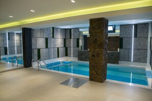 Indoor pool, outdoor pool, pool umbrellas, sun loungers