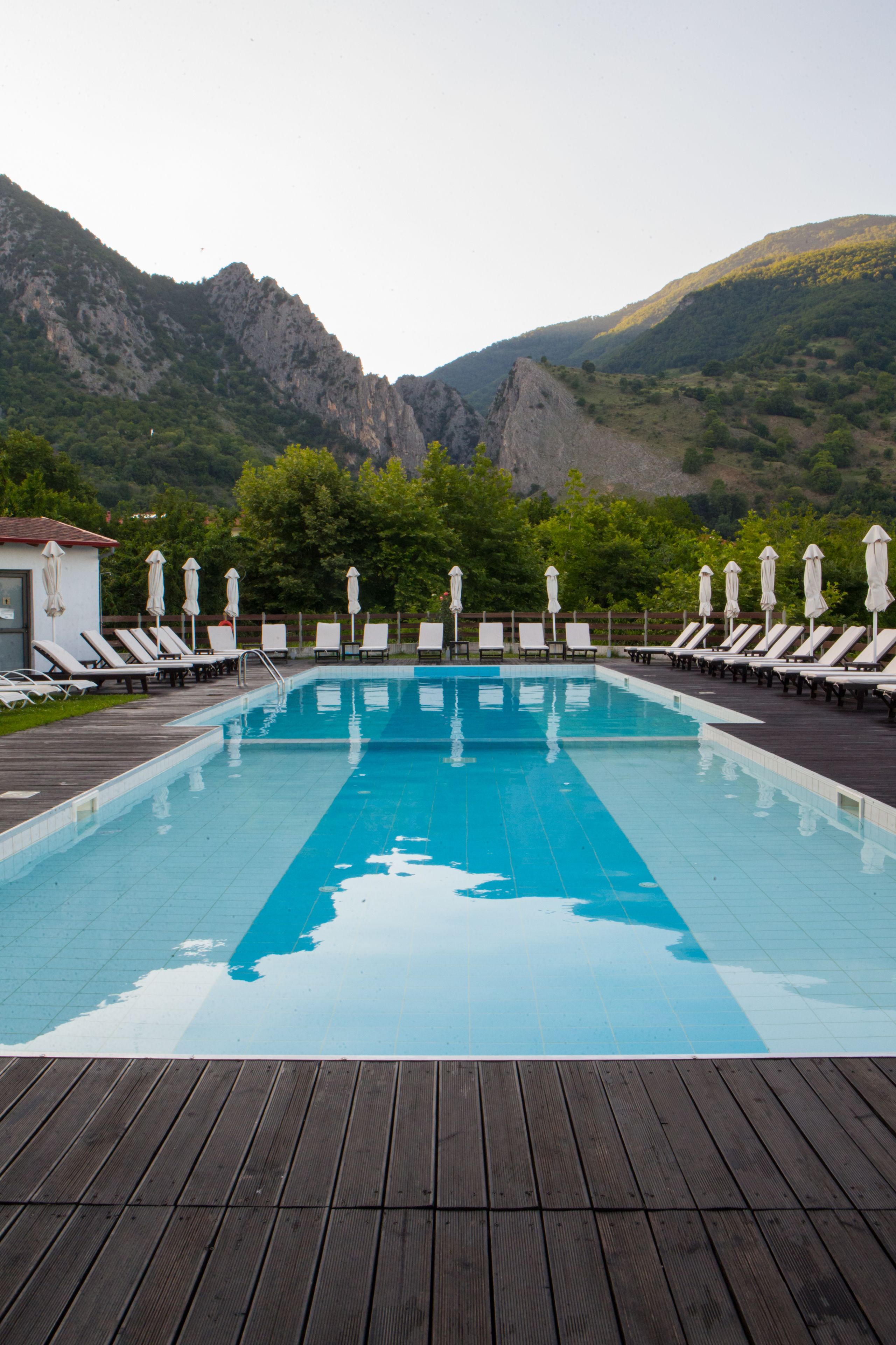 indoor pool, outdoor pool, pool umbrellas, pool loungers