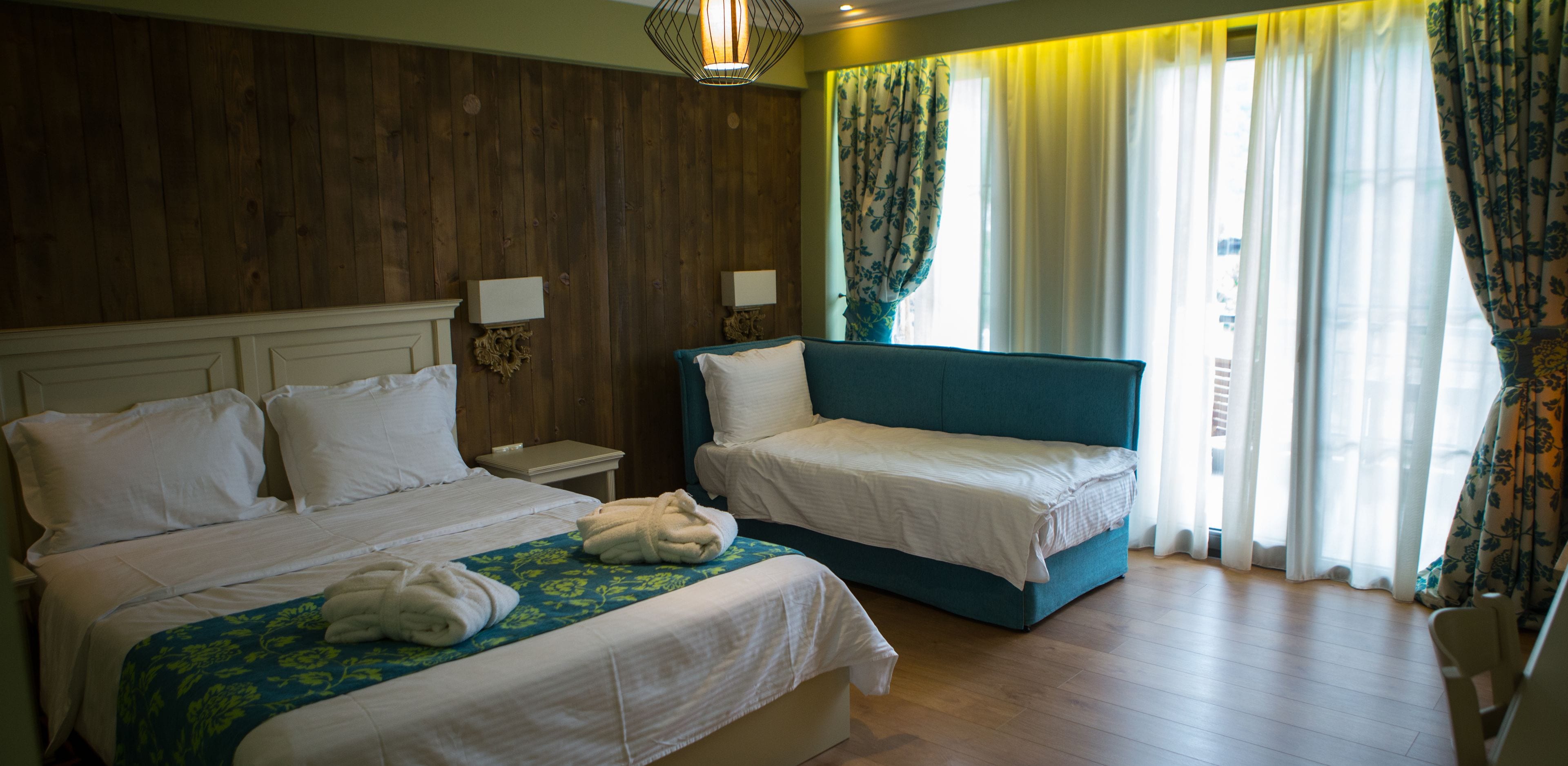 triple room | in-room safe, desk, blackout curtains, soundproofing