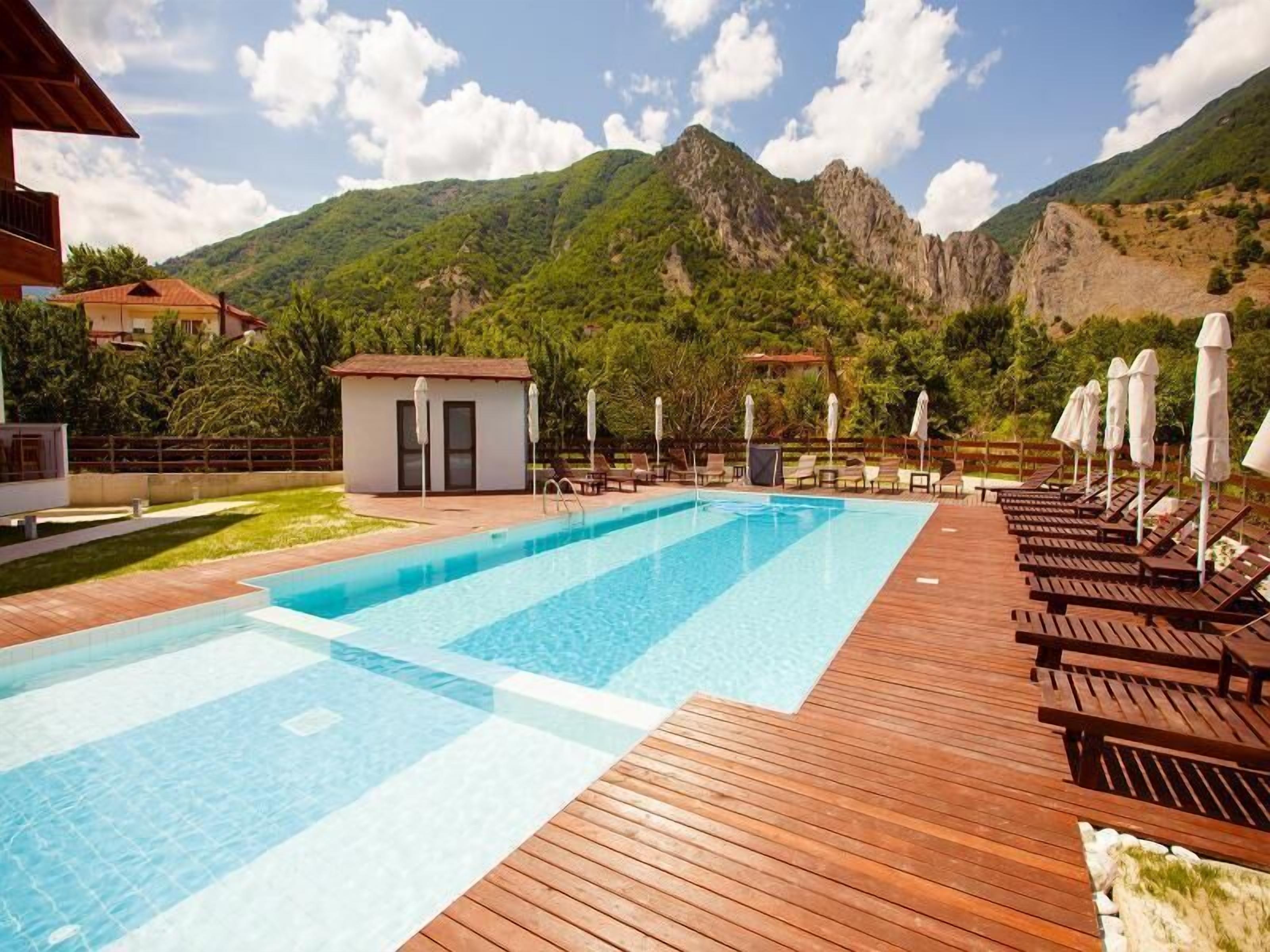 indoor pool, outdoor pool, pool umbrellas, pool loungers