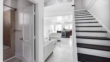 Deluxe Loft, 2 Bedrooms, Kitchen | Living area | Flat-screen TV