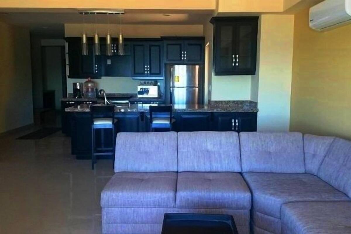Family Condo, 2 Bedrooms, Ocean View | Living area | Flat-screen TV