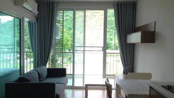 1-Bedroom Condo, Mountain View | Living area | 32-inch LED TV with digital channels, TV