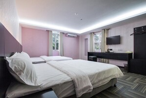 Family Studio Suite, 2 Double Beds, City View | Iron/ironing board, free WiFi, bed sheets