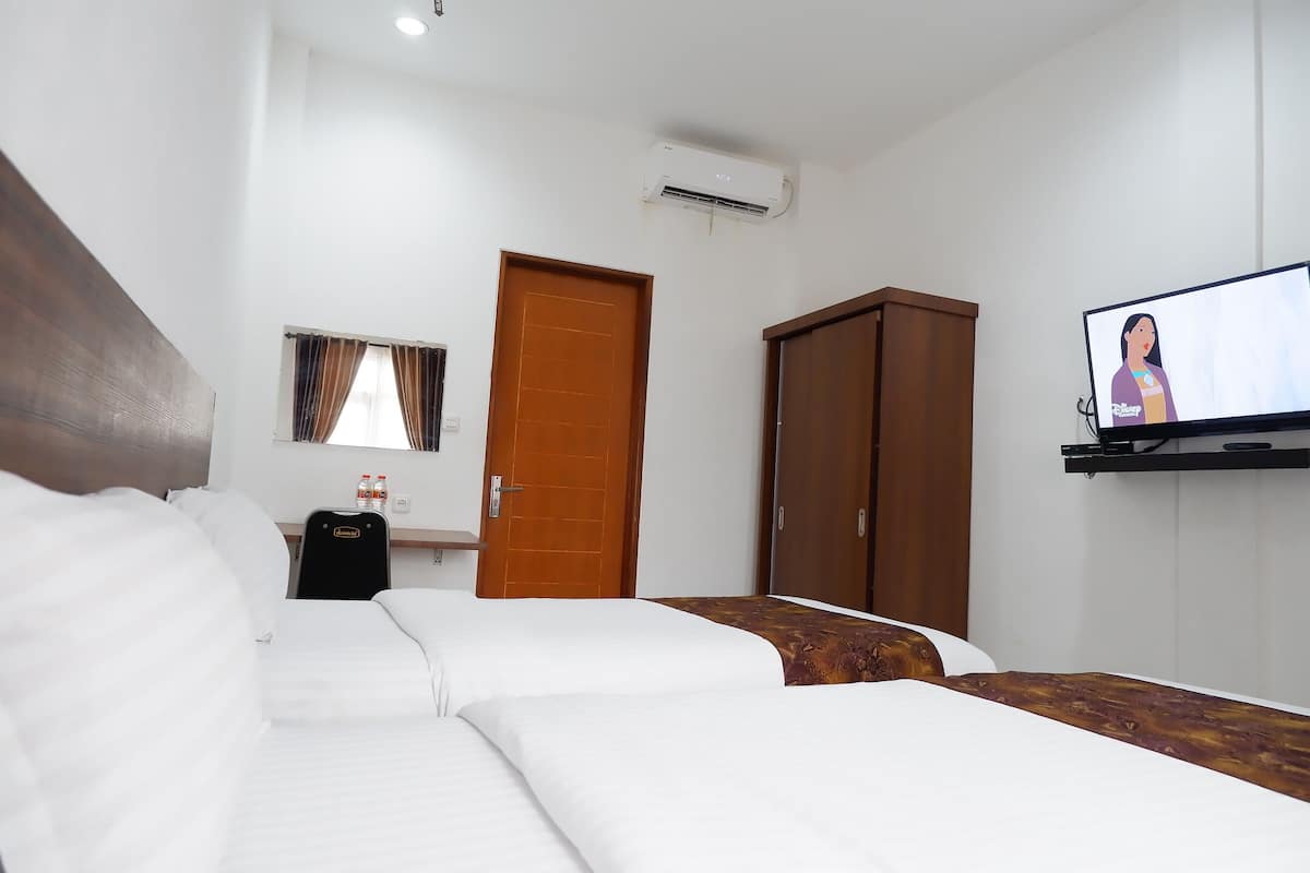 Habitación Deluxe | Baño | Ducha, toallas, jabón y champú