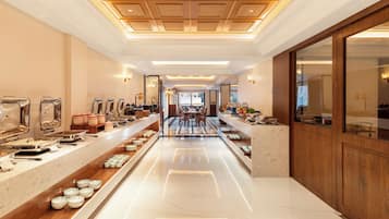 Breakfast, lunch served; local and international cuisine, pool views