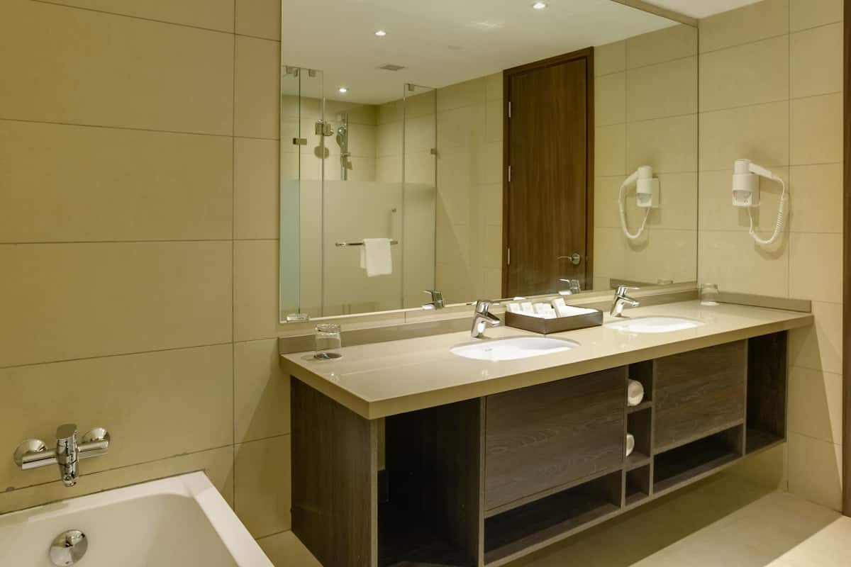 superior suite | bathroom | shower, rainfall showerhead, free toiletries, hair dryer