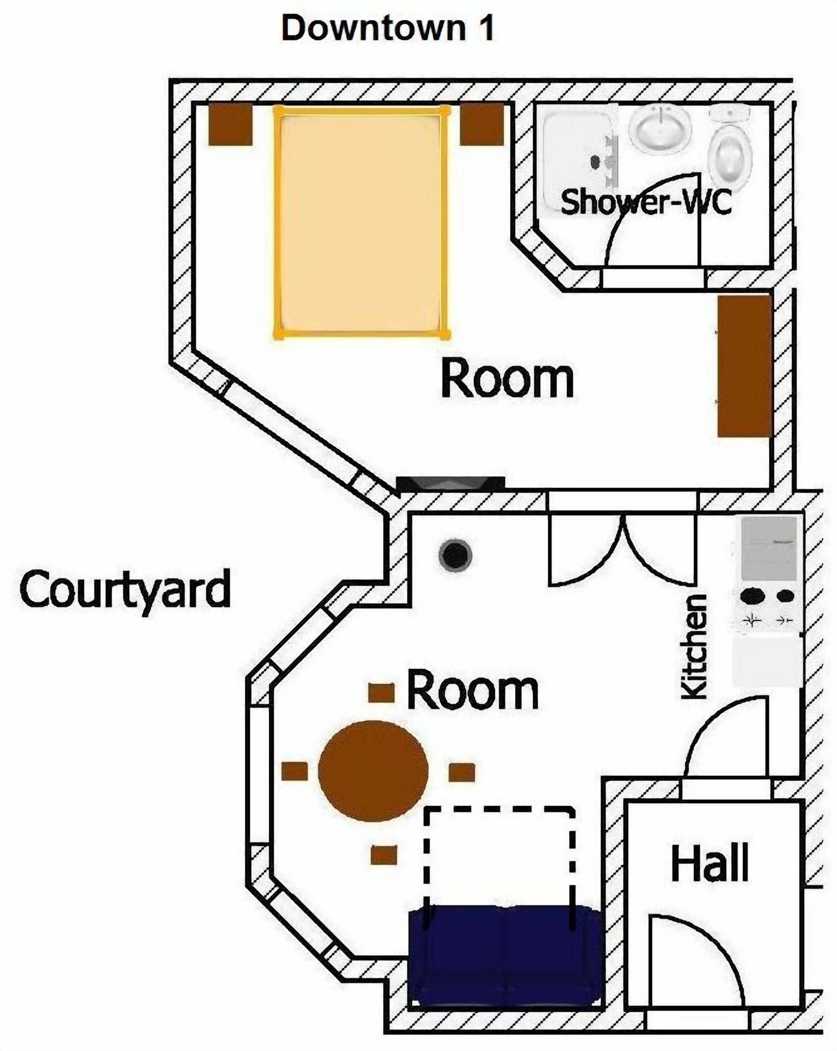 A floor plan of a hotel with a room, a shower, a kitchen, a courtyard, and a hall.