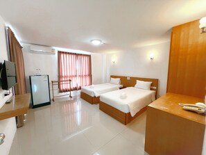 Deluxe Room | Meja kerja, tirai kedap cahaya, dan Wi-Fi gratis