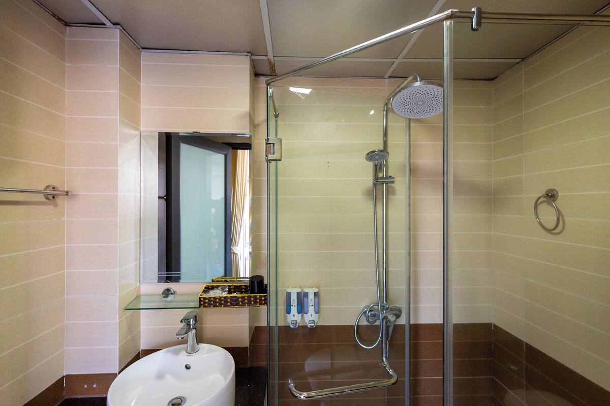 hair dryer, bidet, towels