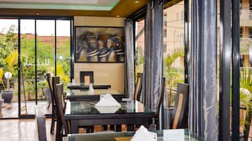 Breakfast, lunch, dinner served; local and international cuisine