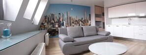 City-Studiosuite | Wohnbereich | Flachbildfernseher