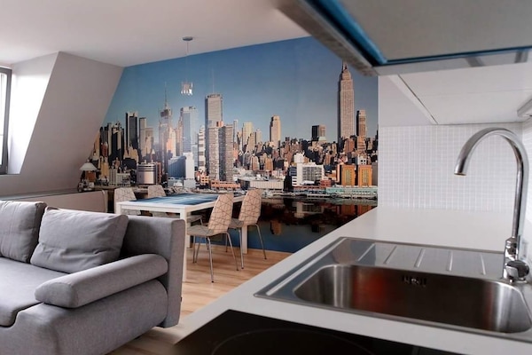 City Studio Suite | Living area | Flat-screen TV