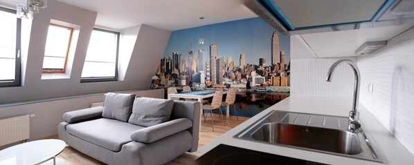 City-Studiosuite | Wohnbereich | Flachbildfernseher